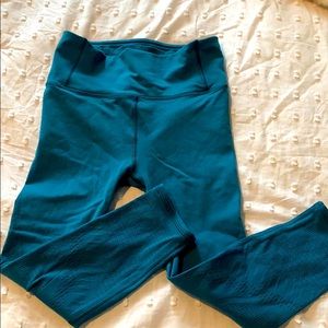 Lululemon teal laser cut tights